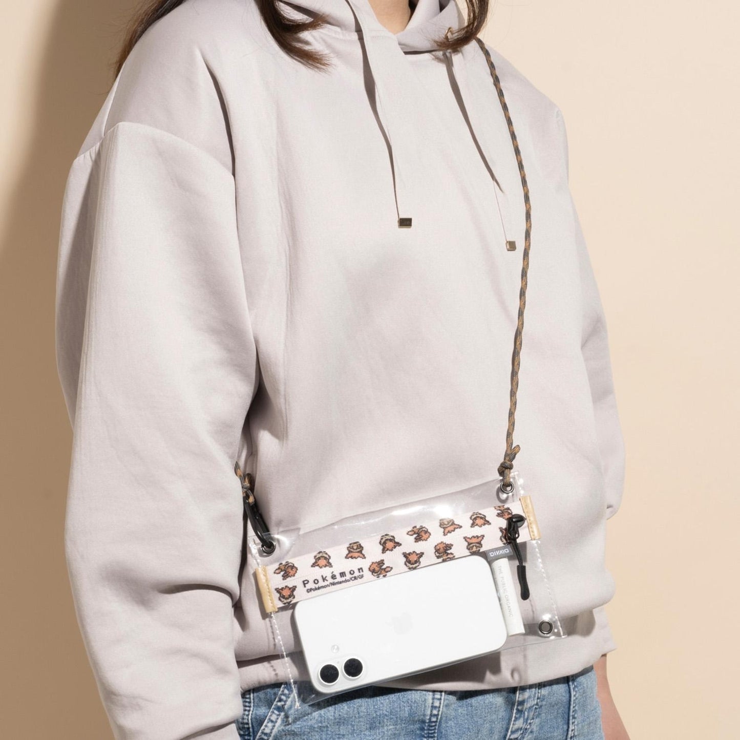 Bolso transparente DIVAID Eevee 
Accesorio para smartphones y celulares.