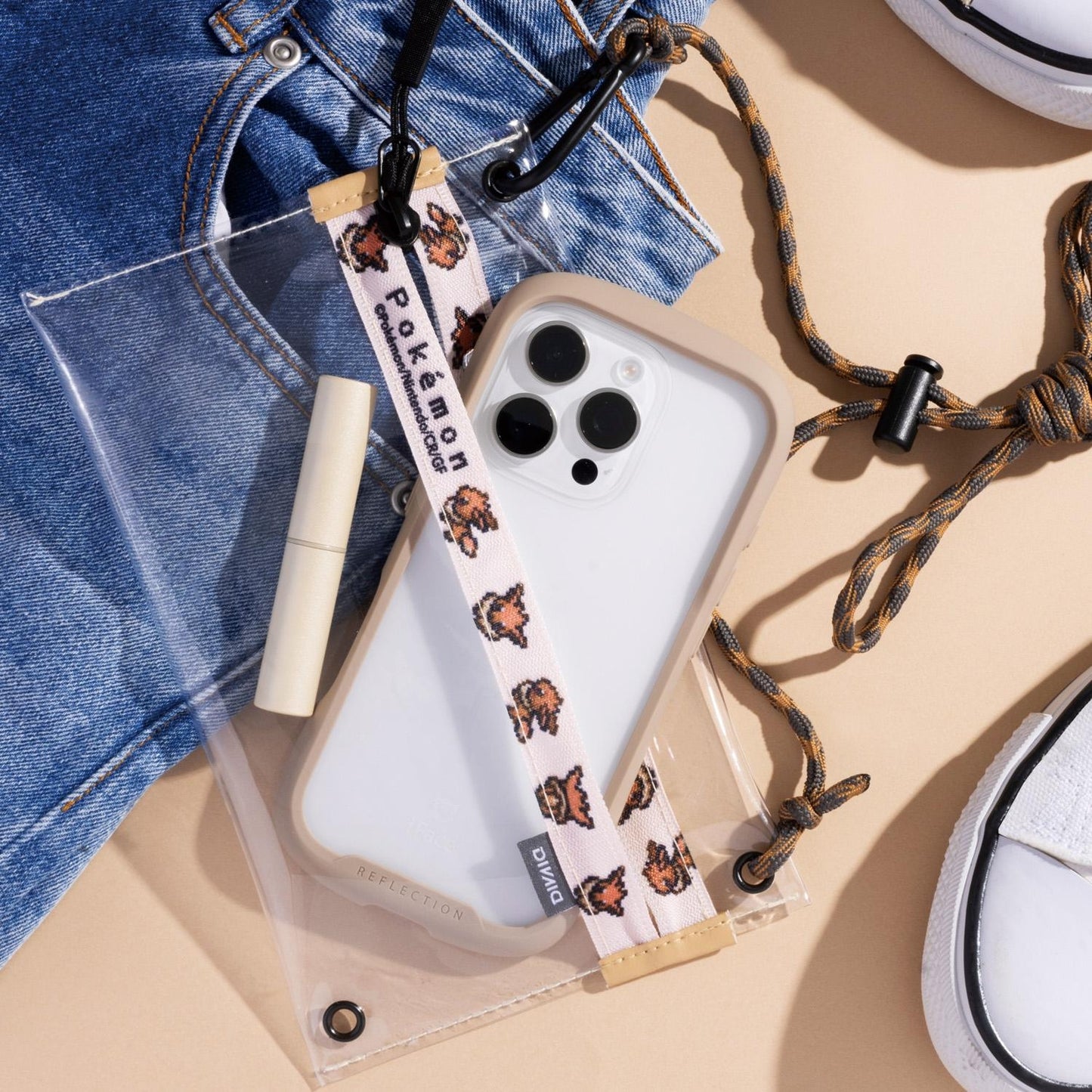Bolso transparente DIVAID Eevee 
Accesorio para smartphones y celulares.